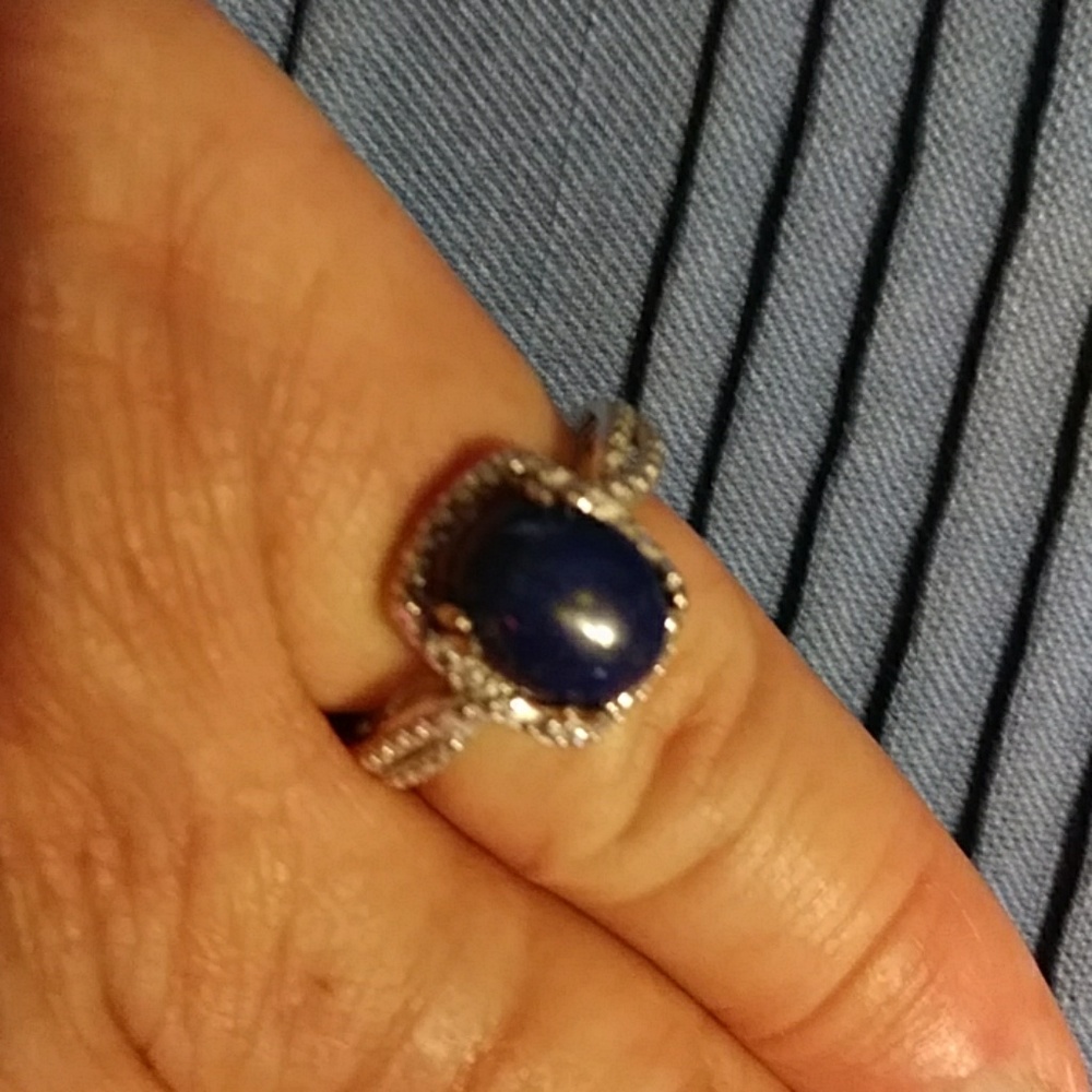 -LAPIS LAZULI, OVAL CABOCHON IN A SQUARE SETTING OF STERLING, RING, SIZE 6.